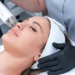 Relaxed woman getting a professional facial in a spa or clinic.