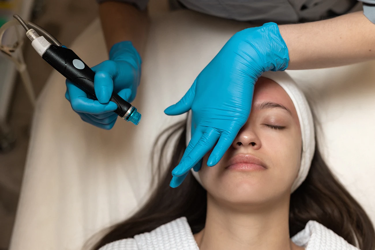 Woman receiving hydrafacial treatment
